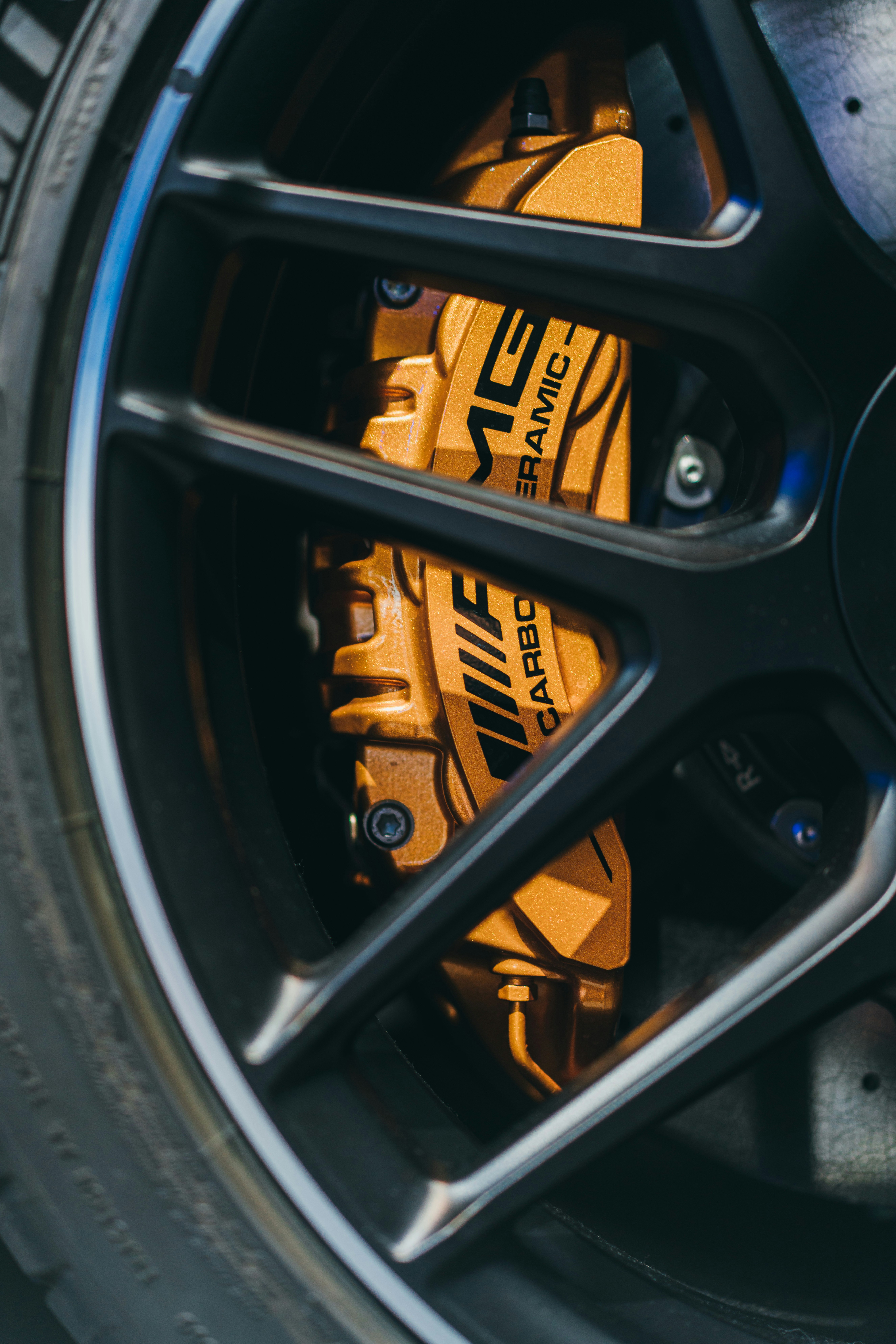 black and yellow wheel with tire